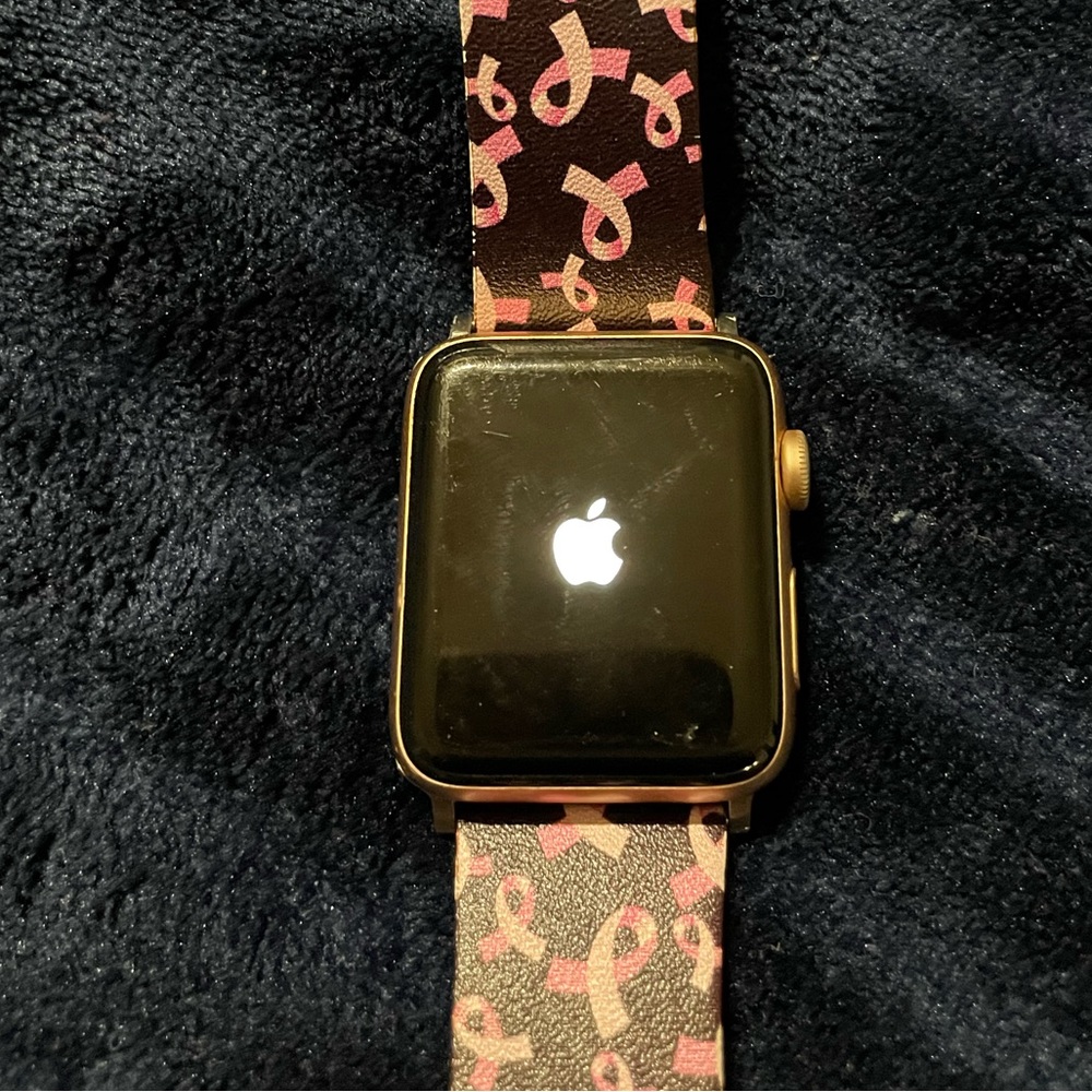 Apple Watch series 3 with Three watch bands and apple charger